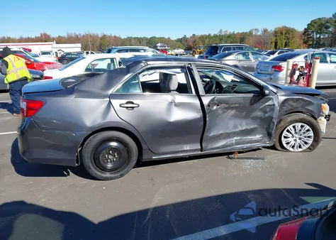 2014 Toyota Camry Le z USA, uszkodzony, nr VIN 4T4BF1FK5ER415032